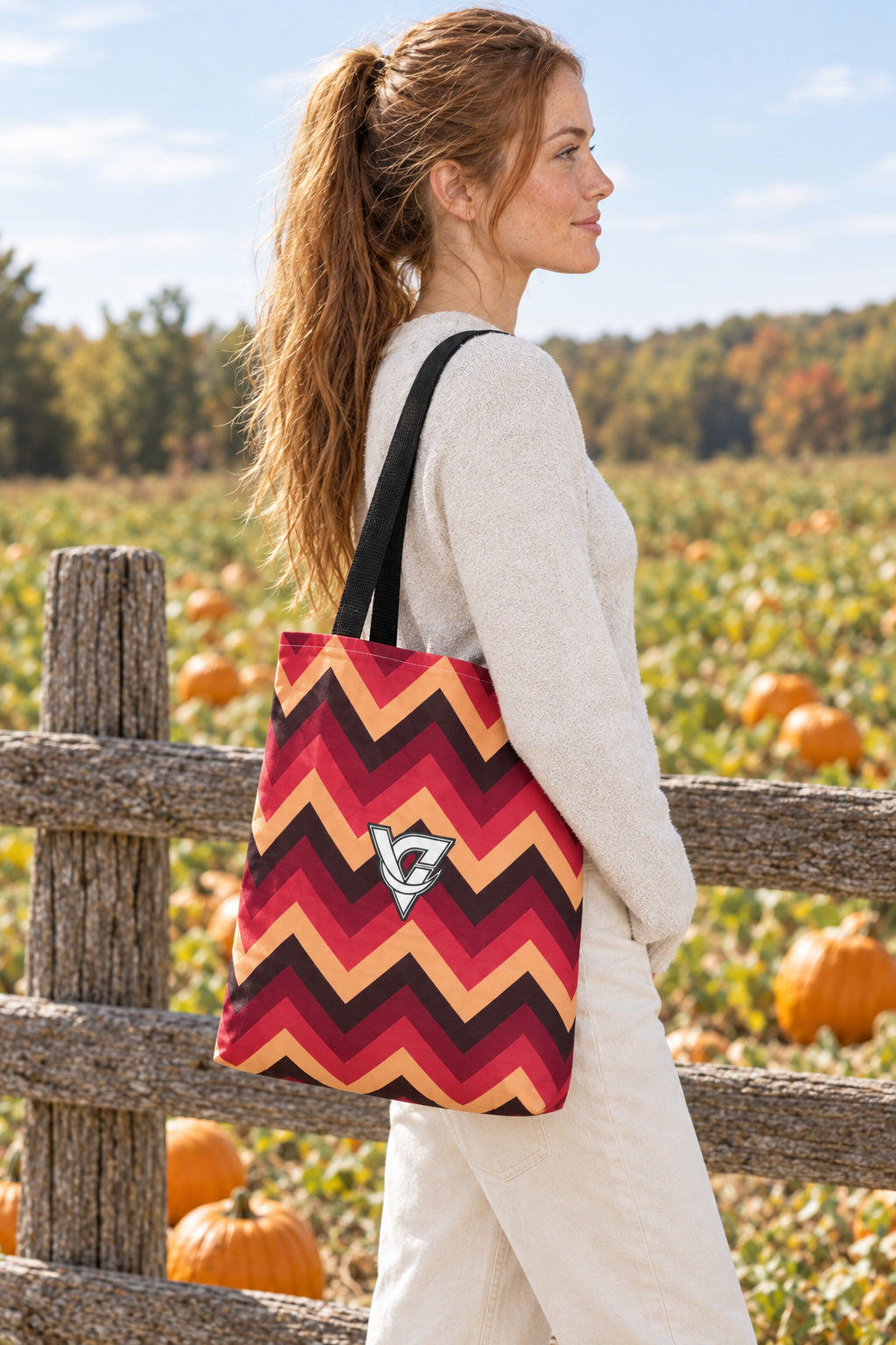 Cranberry Chevron Tote Bag — All-Over Print Gym & Everyday Tote, AI-generated side-profile product mockup on a fictional adult model