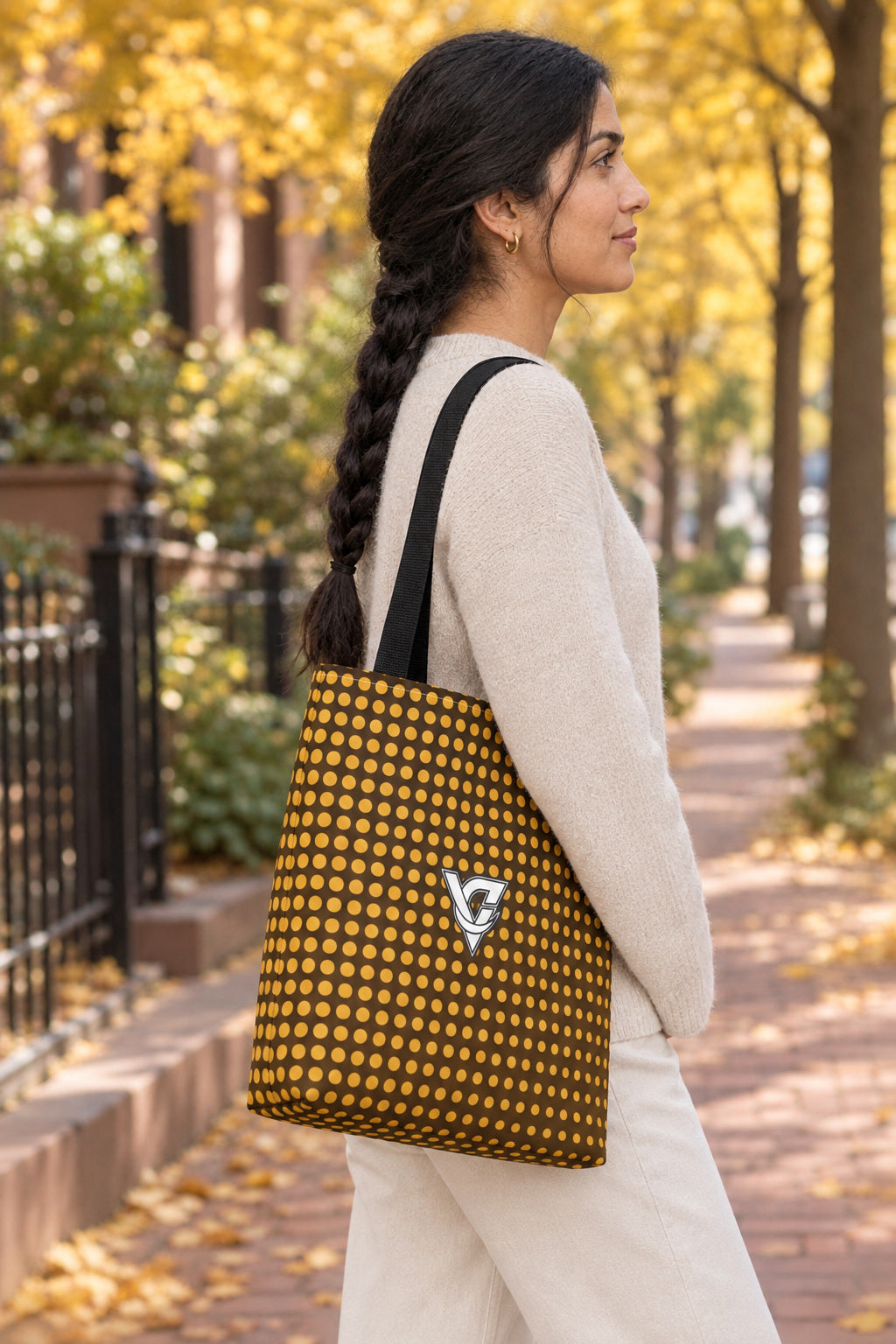 Harvest Gold Halftone Tote Bag — All-Over Print Gym & Everyday Tote, AI-generated side-profile product mockup on a fictional adult model