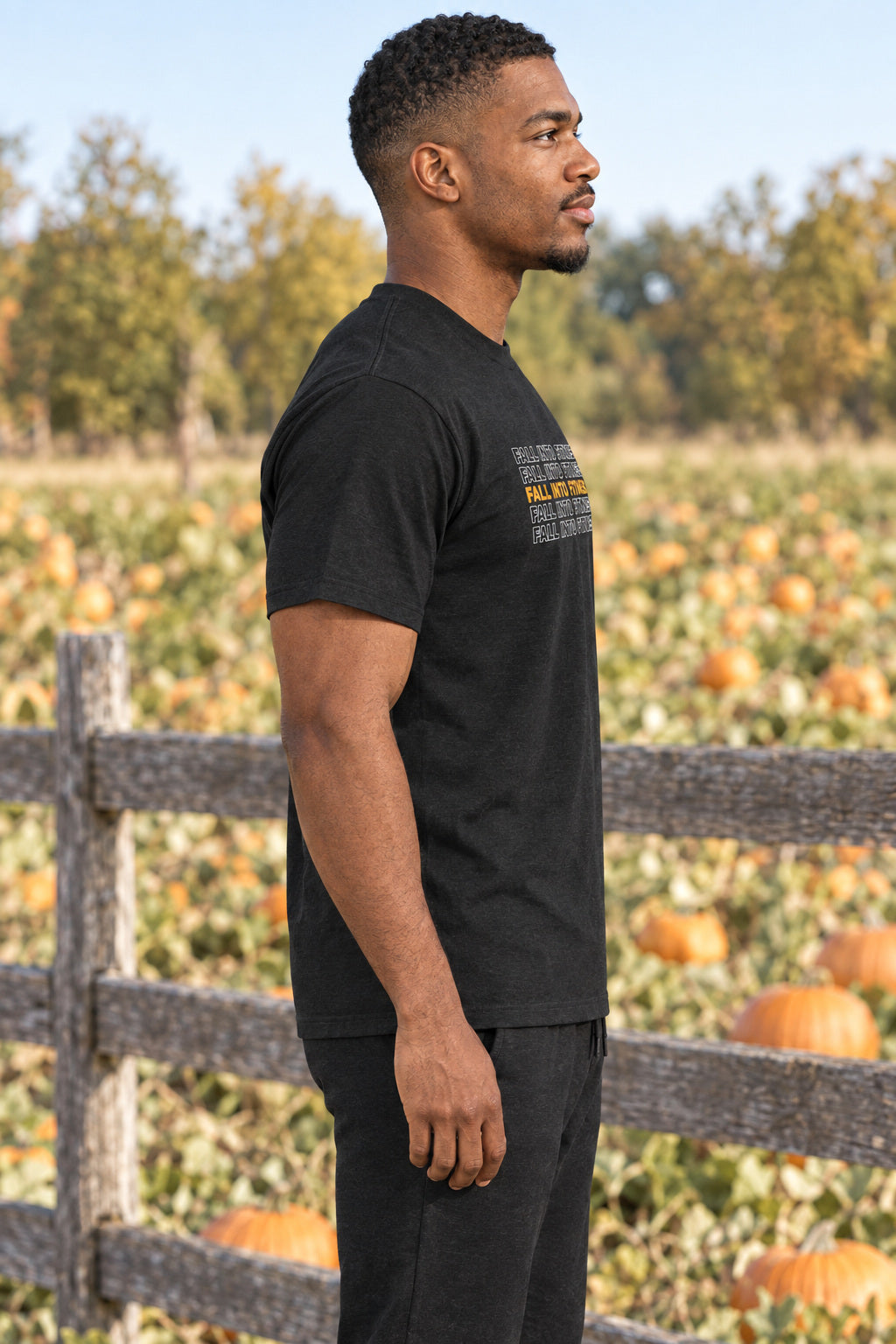 Fall Into Fitness | Men's Graphic Gym T-Shirt, AI-generated side-profile product mockup on a fictional adult model
