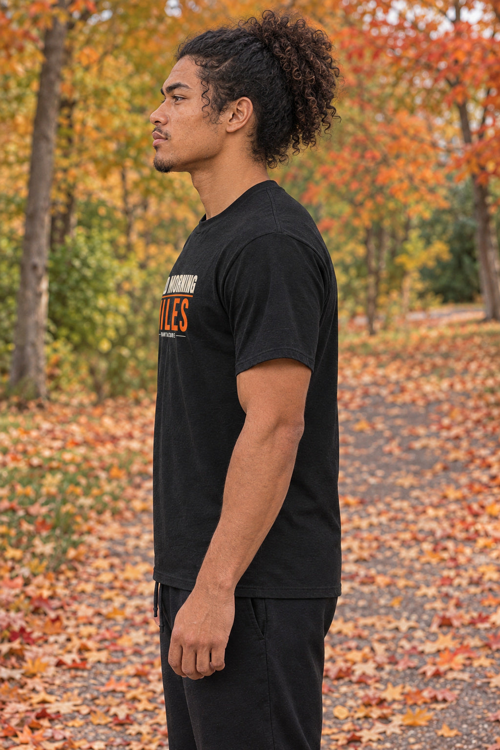 Cold Morning Miles | Men's Graphic Gym T-Shirt, AI-generated side-profile product mockup on a fictional adult model