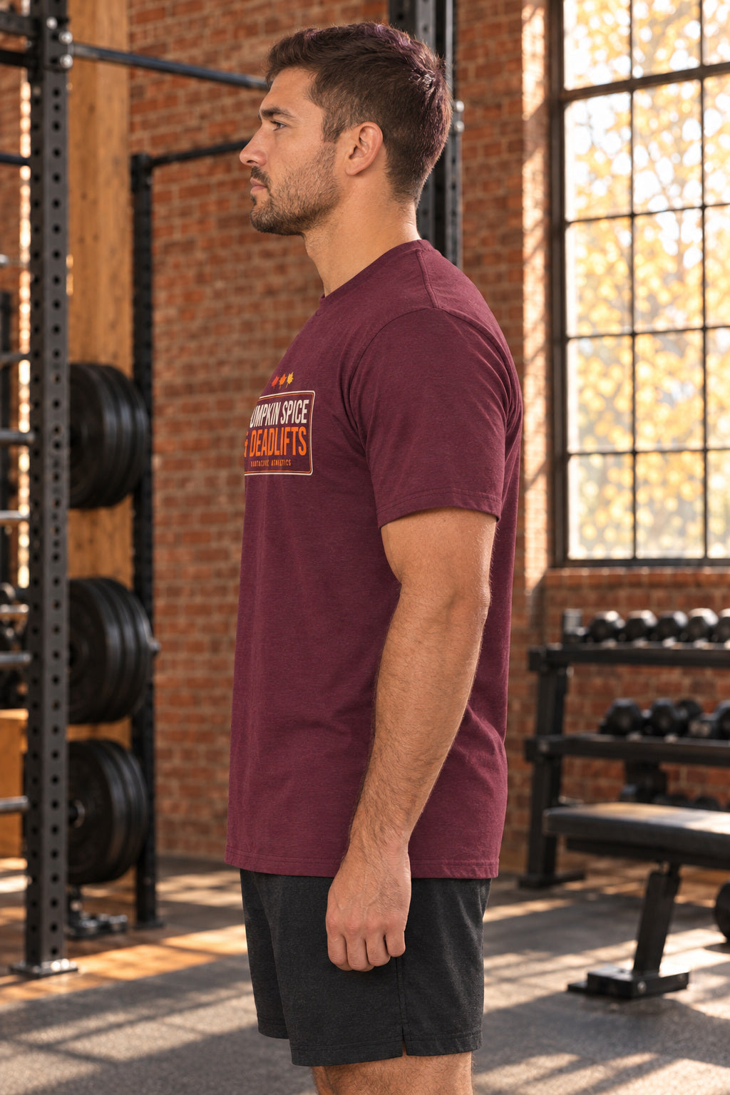 Pumpkin Spice & Deadlifts | Men's Graphic Gym T-Shirt, AI-generated side-profile product mockup on a fictional adult model