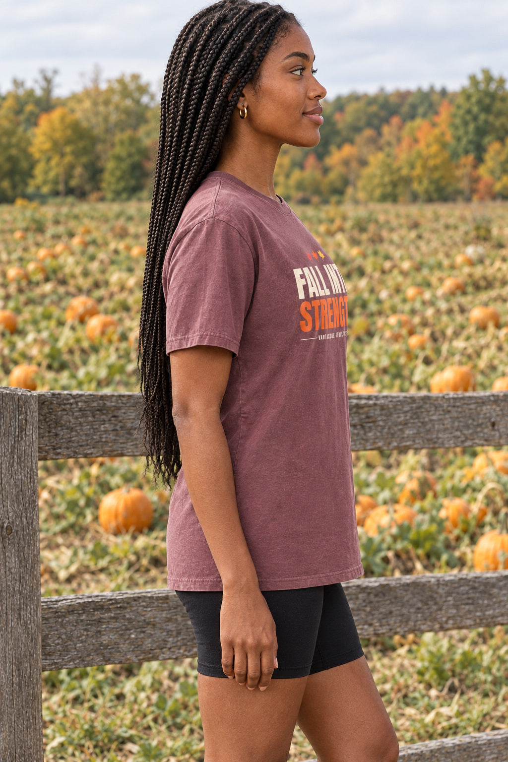 Fall Into Strength | Women's Garment-Dyed Graphic Tee, AI-generated side-profile product mockup on a fictional adult model