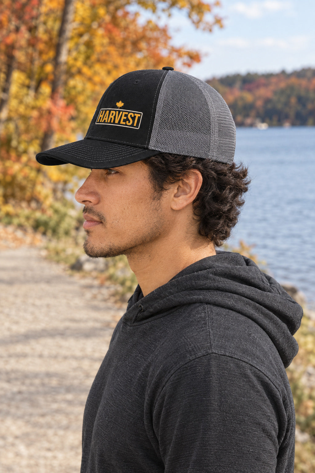 Harvest Trucker Cap — Vantacore Snapback Hat, AI-generated side-profile product mockup on a fictional adult model