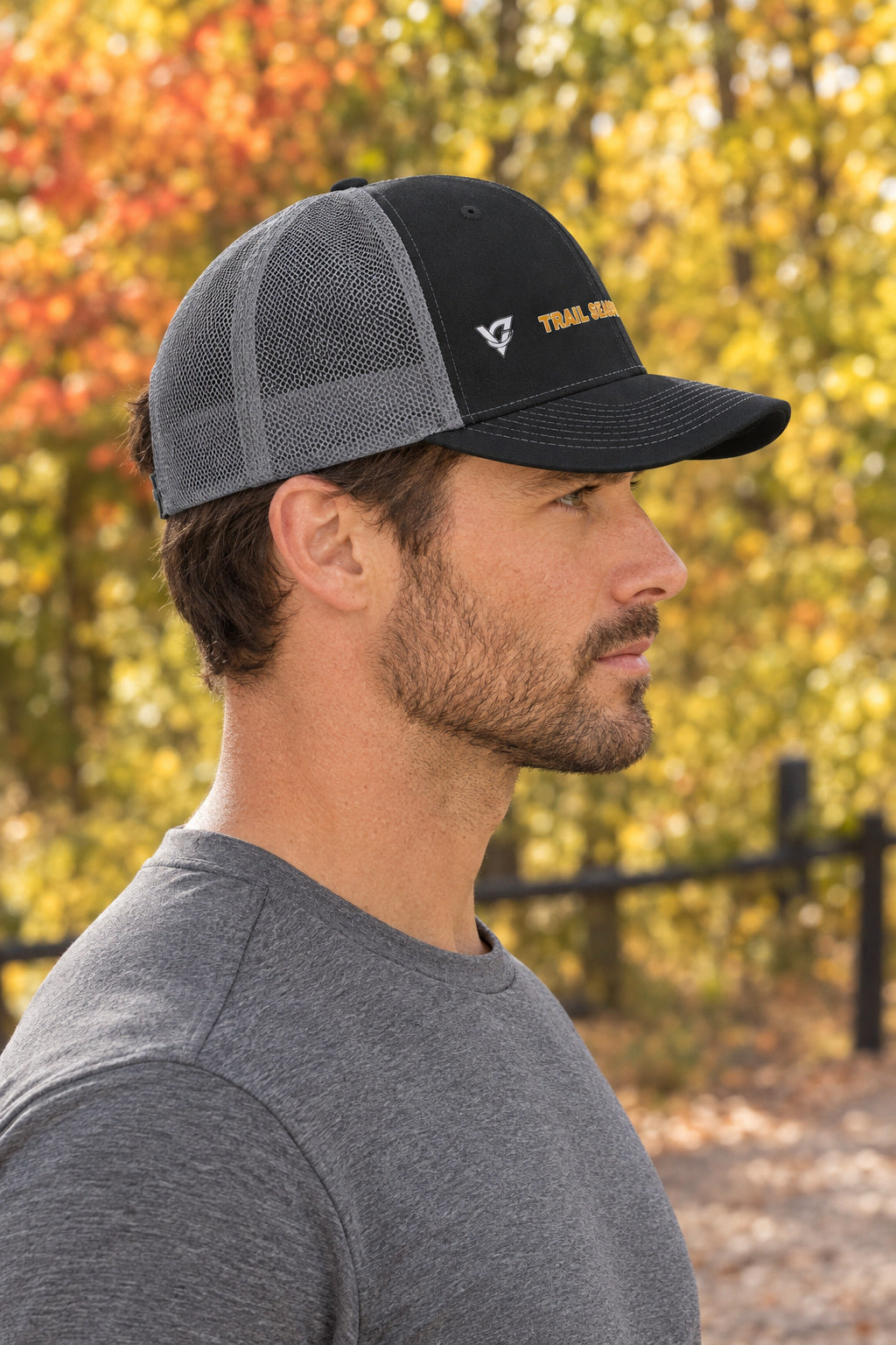 Trail Season Trucker Cap — Vantacore Snapback Hat, AI-generated side-profile product mockup on a fictional adult model