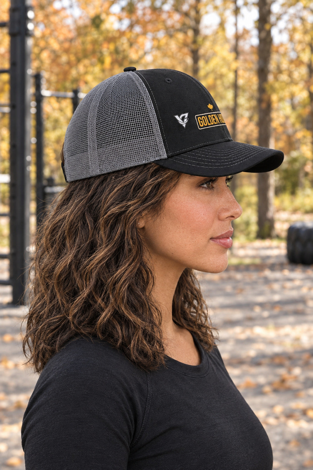 Golden Hour Trucker Cap — Vantacore Snapback Hat, AI-generated side-profile product mockup on a fictional adult model