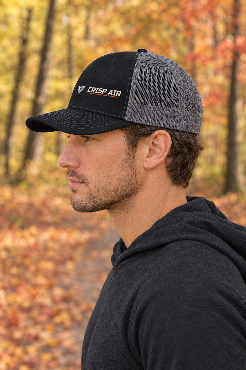 Crisp Air Trucker Cap — Vantacore Snapback Hat, AI-generated side-profile product mockup on a fictional adult model