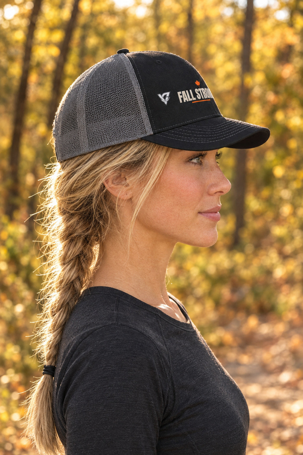 Fall Strong Trucker Cap — Vantacore Snapback Hat, AI-generated side-profile product mockup on a fictional adult model