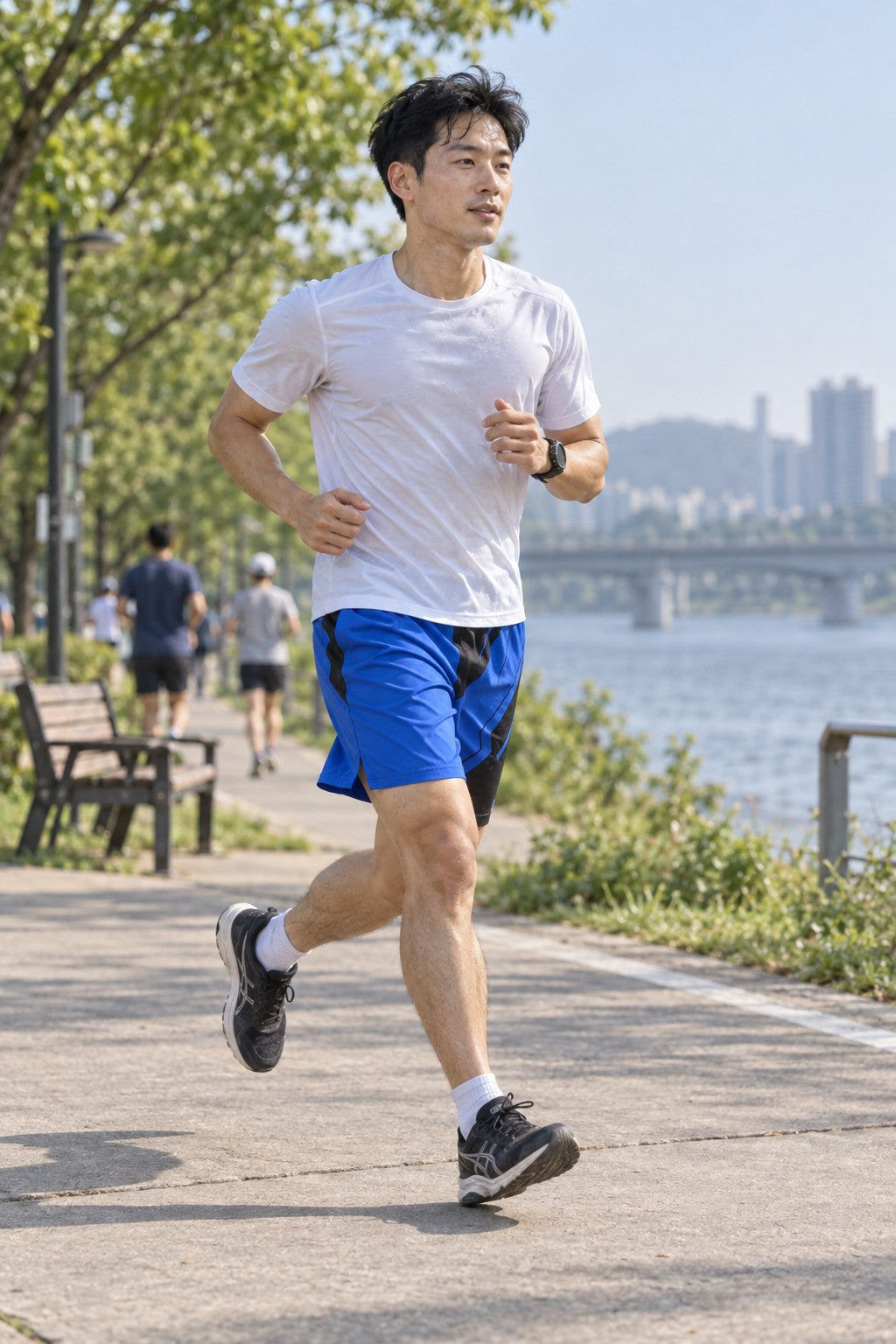 Runner wearing Men's Royal Blue & Black Geometric Jogger Athletic Shorts with Pockets