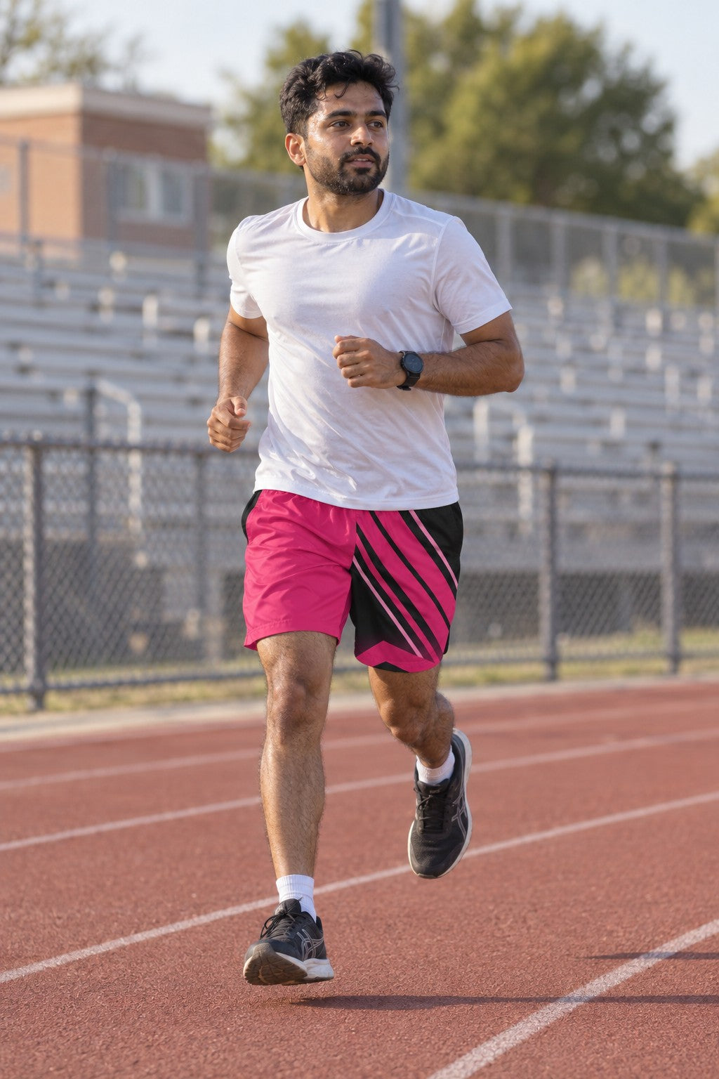 Runner wearing Men's Neon Pink & Black Running Jogger Shorts with Pockets — Athletic Performance AOP