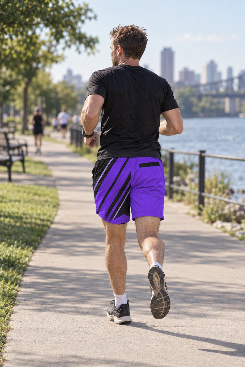 Runner wearing Men's Electric Purple & Black Running Jogger Shorts with Pockets — Athletic Performance AOP — rear view