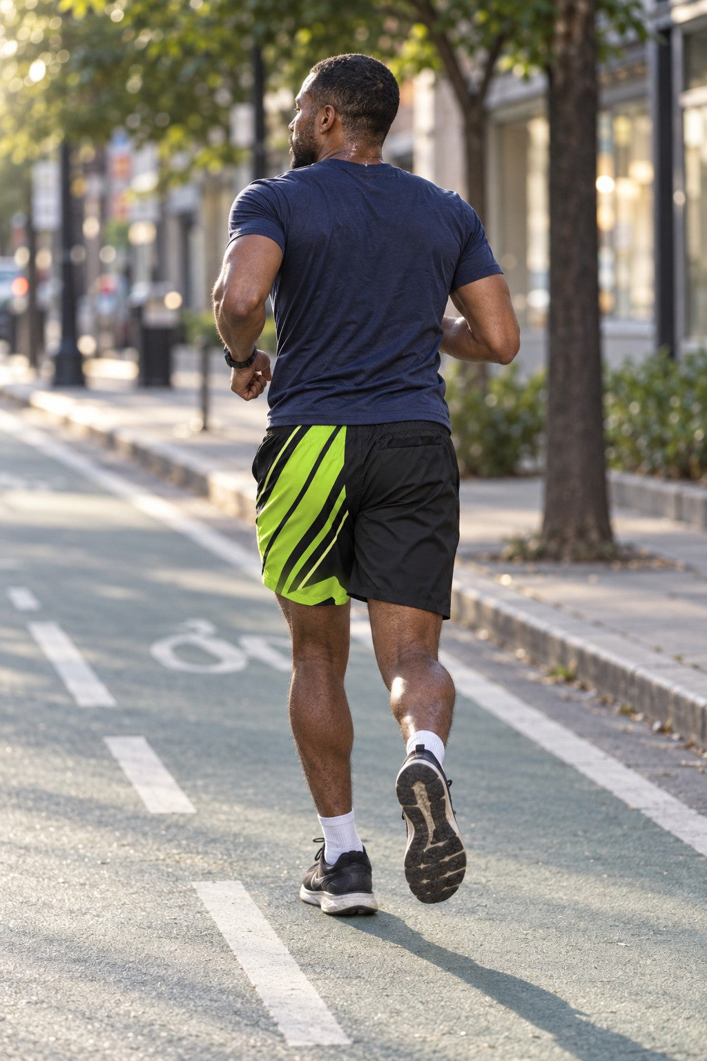 Runner wearing Men's Stealth Black & Volt Running Jogger Shorts with Pockets — Athletic Performance AOP — rear view