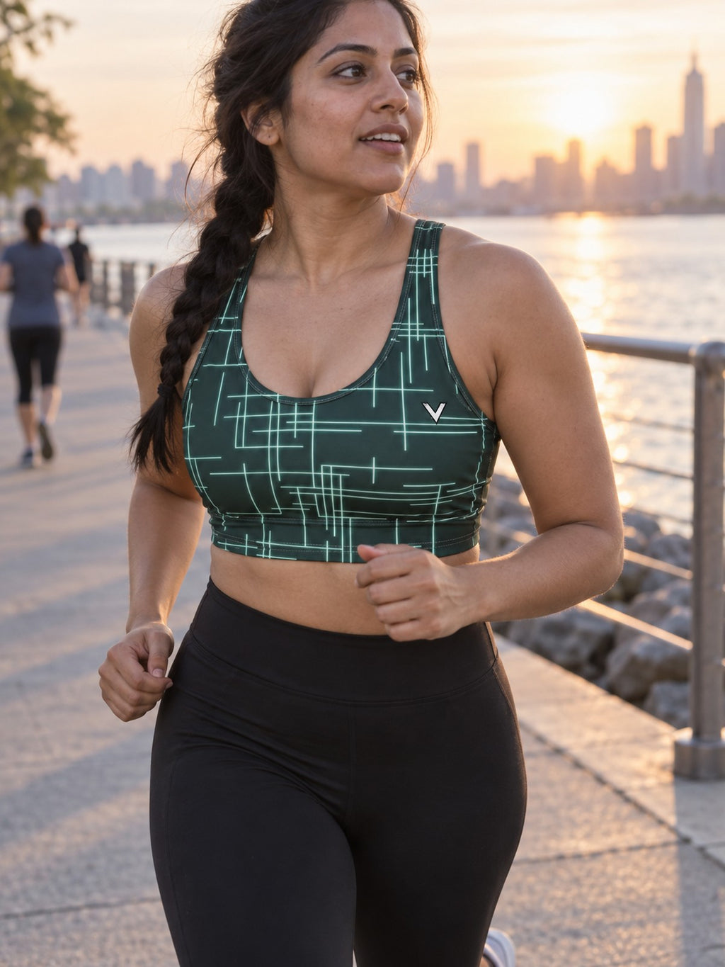 Woman wearing the Mint Circuit Sports Bra
