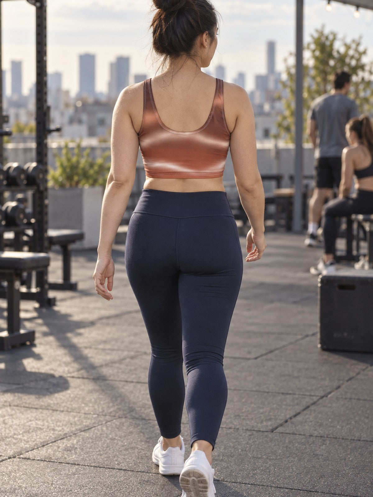 Woman wearing the Peach Aurora Sports Bra