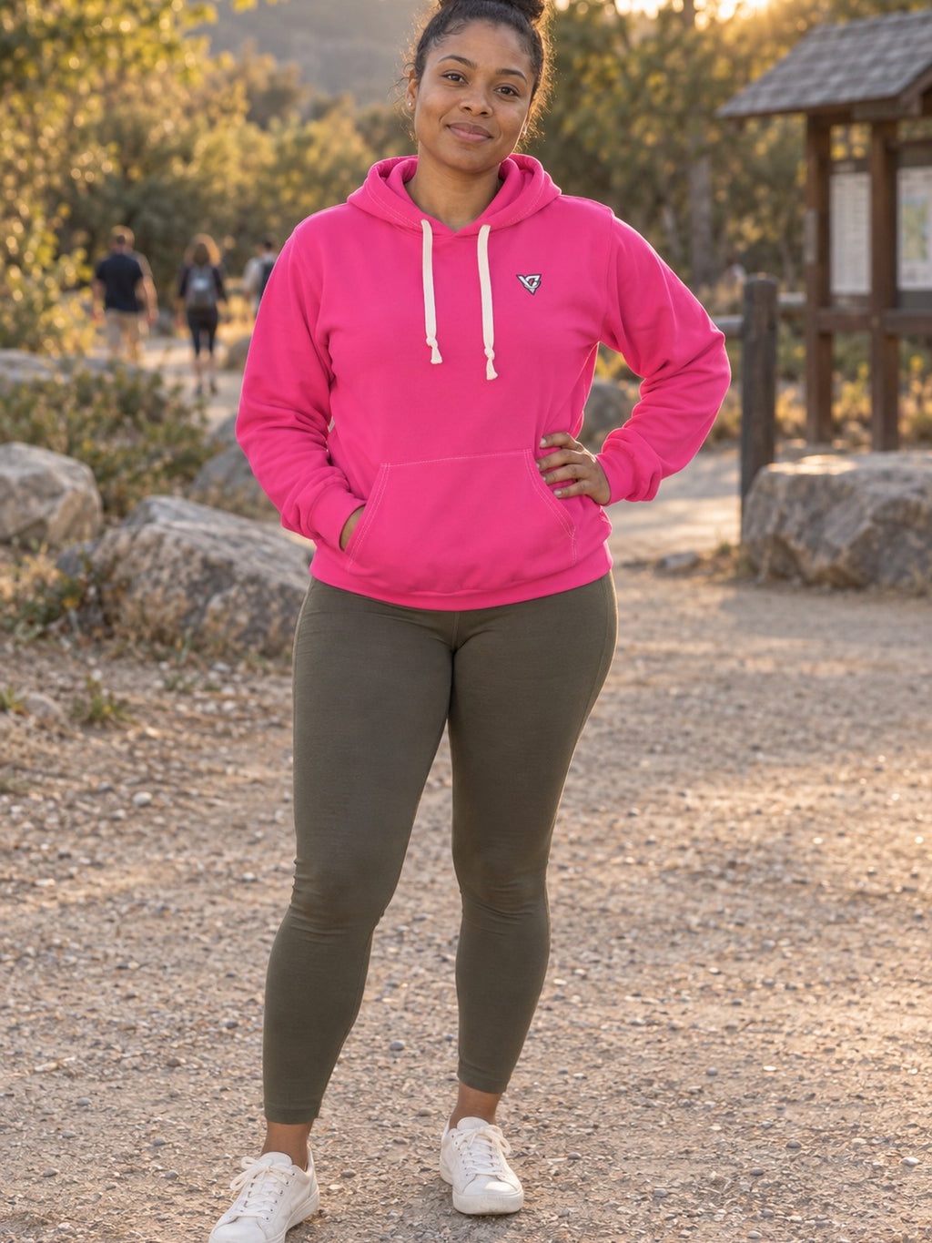 Woman wearing the Hot Pink Essential Women's Pullover Hoodie