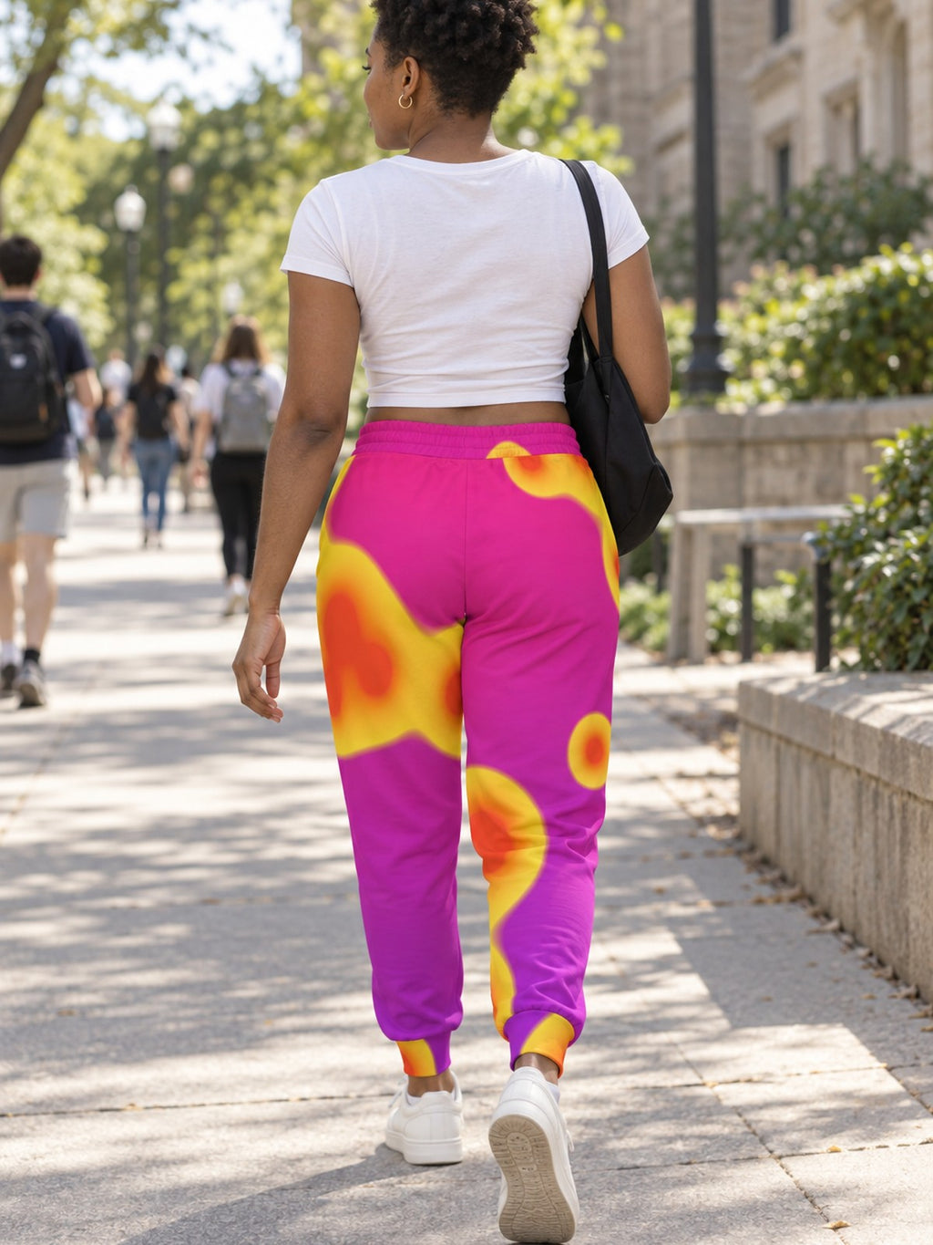 Woman wearing Vantacore Lava Lamp all-over print joggers, back view