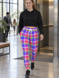 Woman wearing Vantacore Plaid Pop all-over print joggers, front view