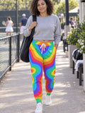 Woman wearing Vantacore Groovy Rings all-over print joggers, front view