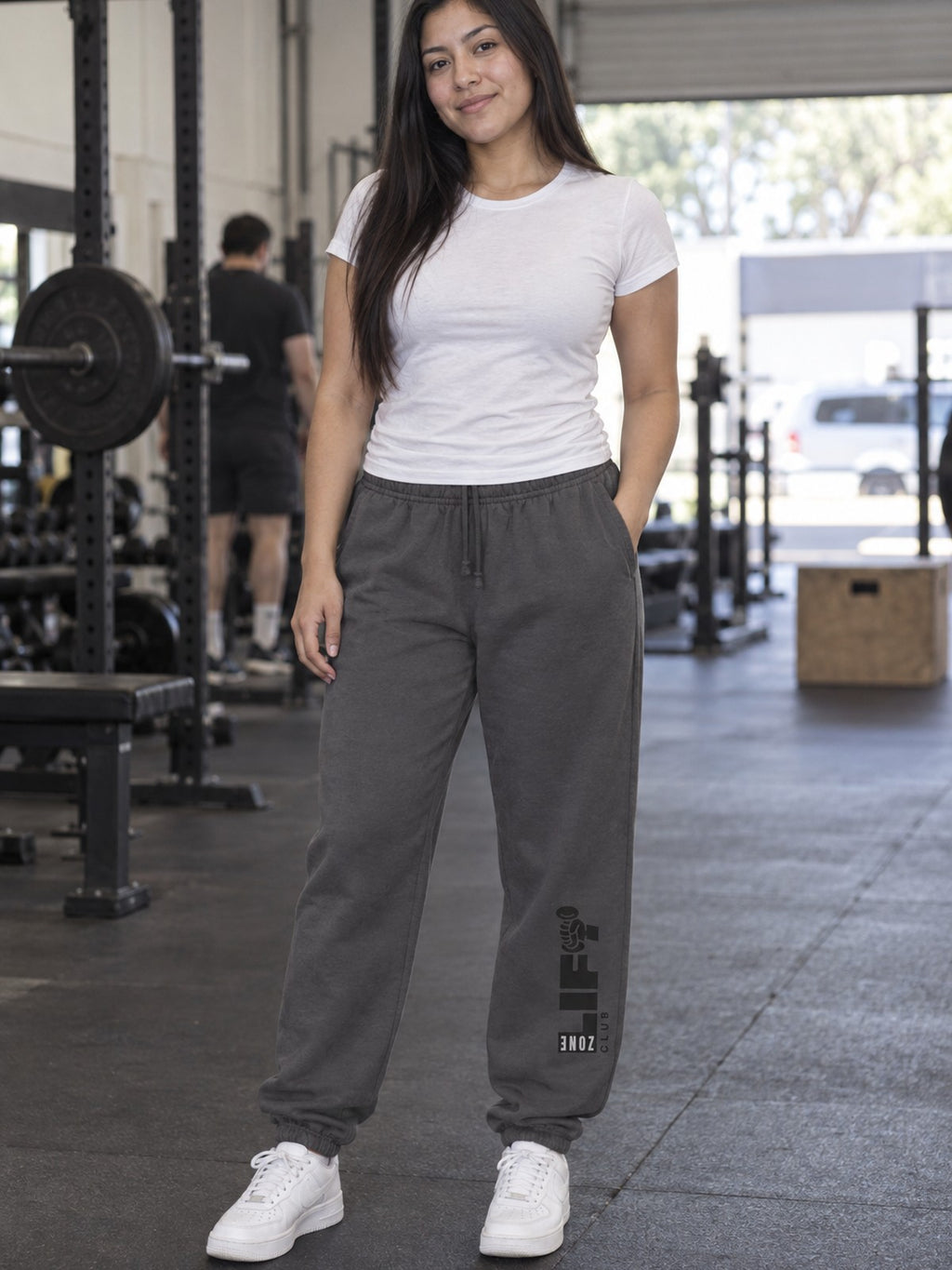 Woman wearing Vantacore LIFT Zone Club graphic sweatpants in Asphalt