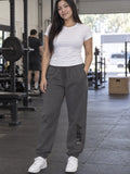 Woman wearing Vantacore LIFT Zone Club graphic sweatpants in Asphalt