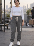 Woman wearing Vantacore Vantacore Athletics logo sweatpants in Asphalt