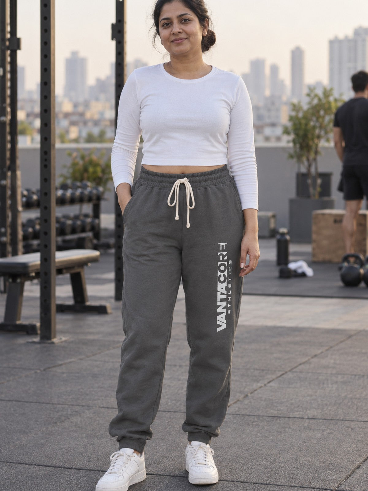 Woman wearing Vantacore Vantacore Athletics logo sweatpants in Asphalt