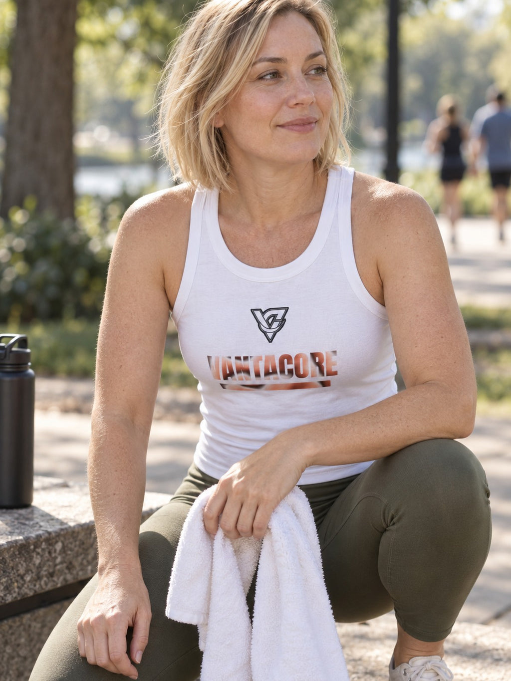 Woman wearing the Peach Tie-Dye Women's Racerback Tank