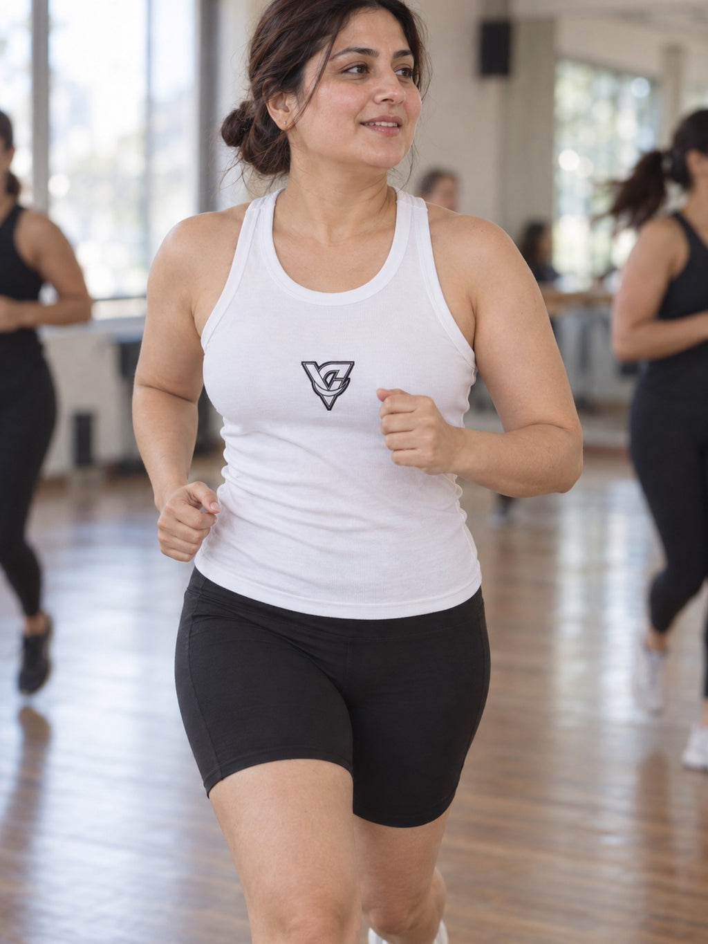 Woman wearing the Bold V Emblem Women's Racerback Tank