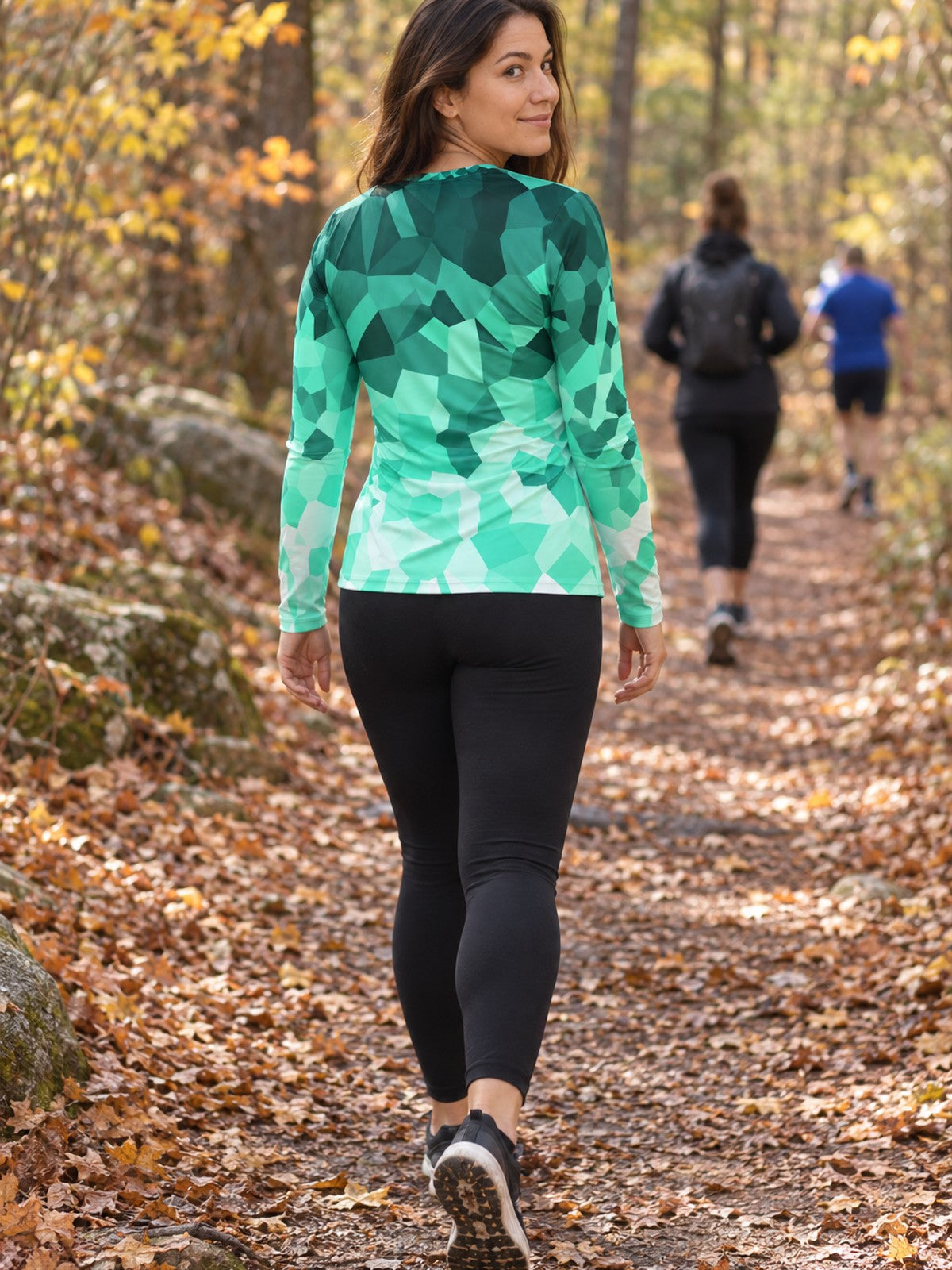 Woman wearing the Mint Shard Women's Long Sleeve V-Neck Athletic Top