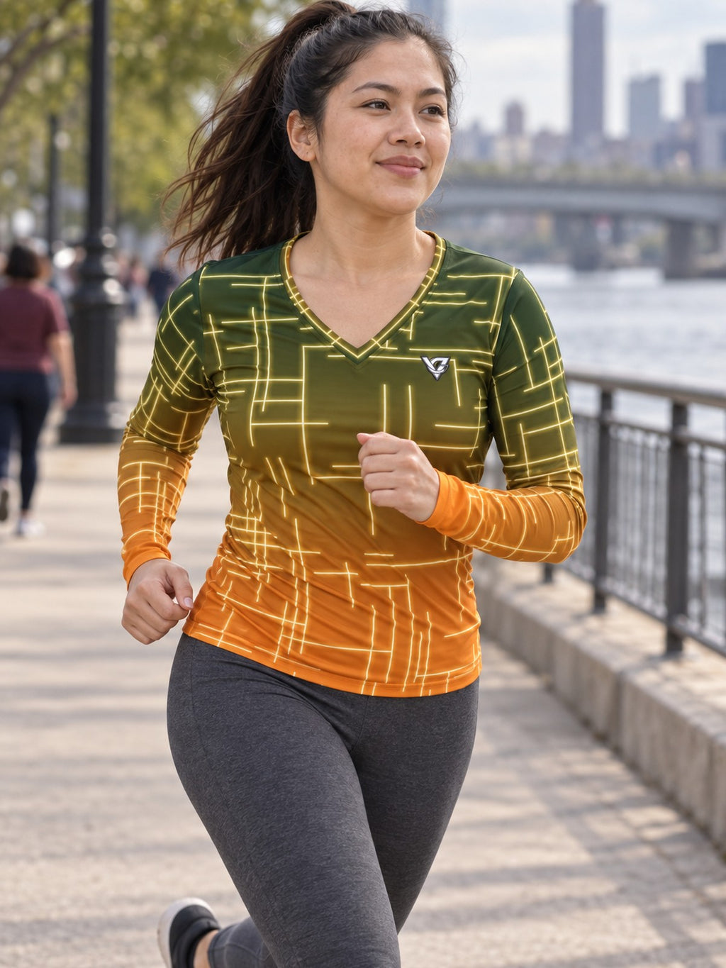 Woman wearing the Citrus Circuit Women's Long Sleeve V-Neck Athletic Top