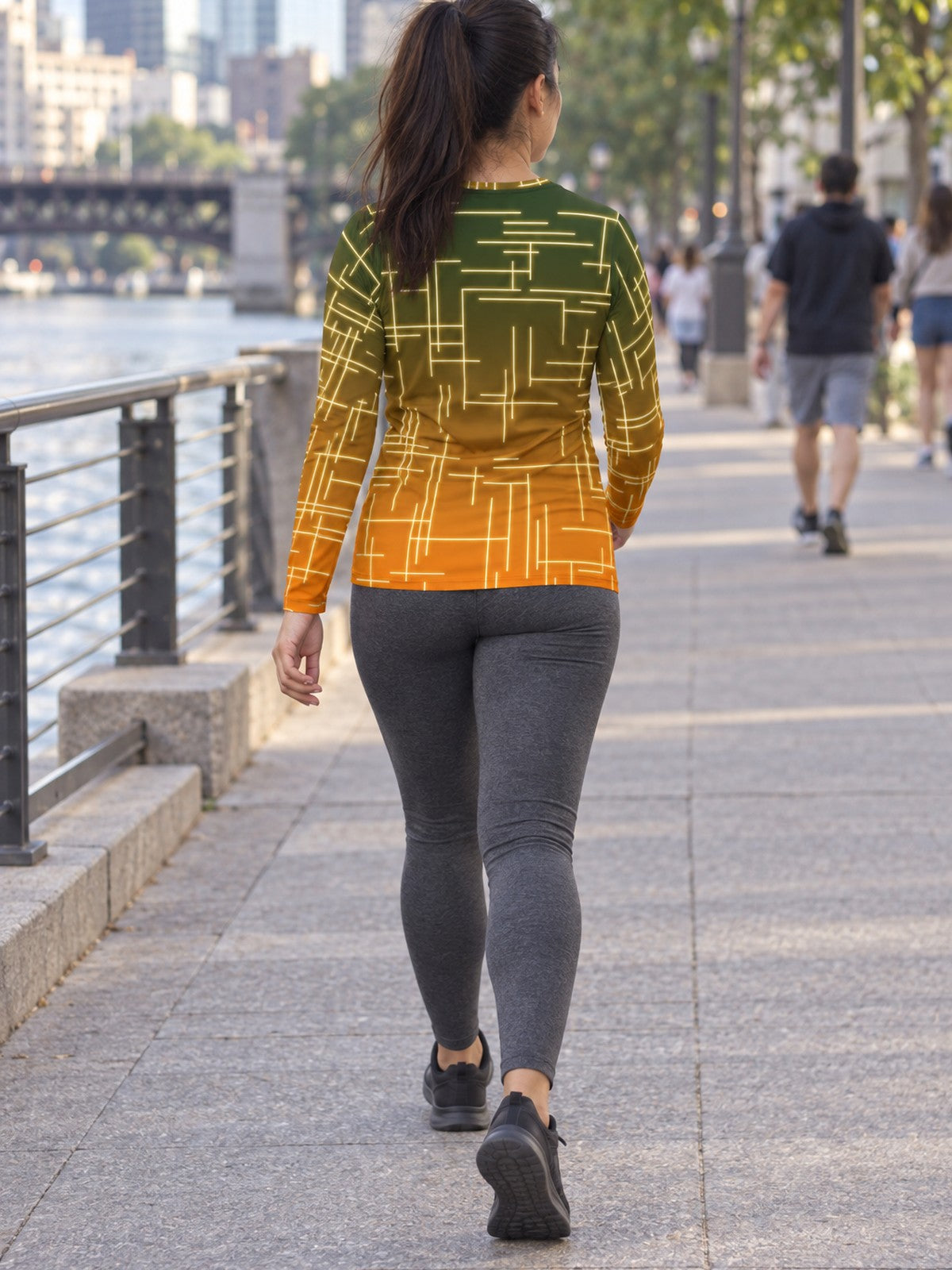 Woman wearing the Citrus Circuit Women's Long Sleeve V-Neck Athletic Top