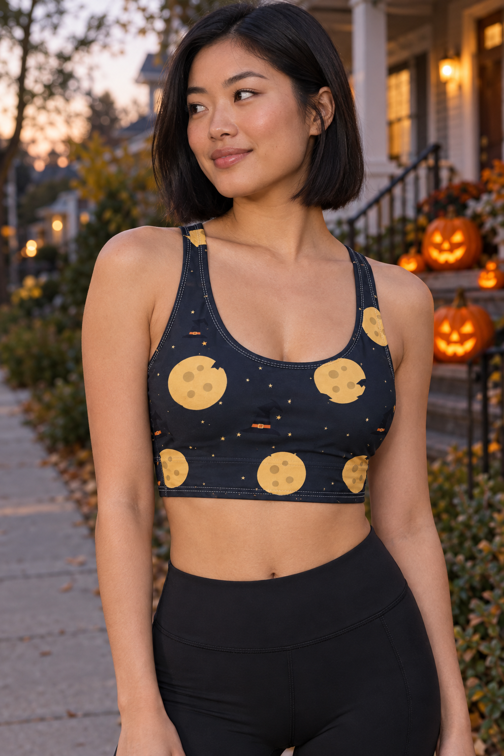 Halloween Ghostly Night Haunted Moon women's scoop-neck sports bra worn on a model