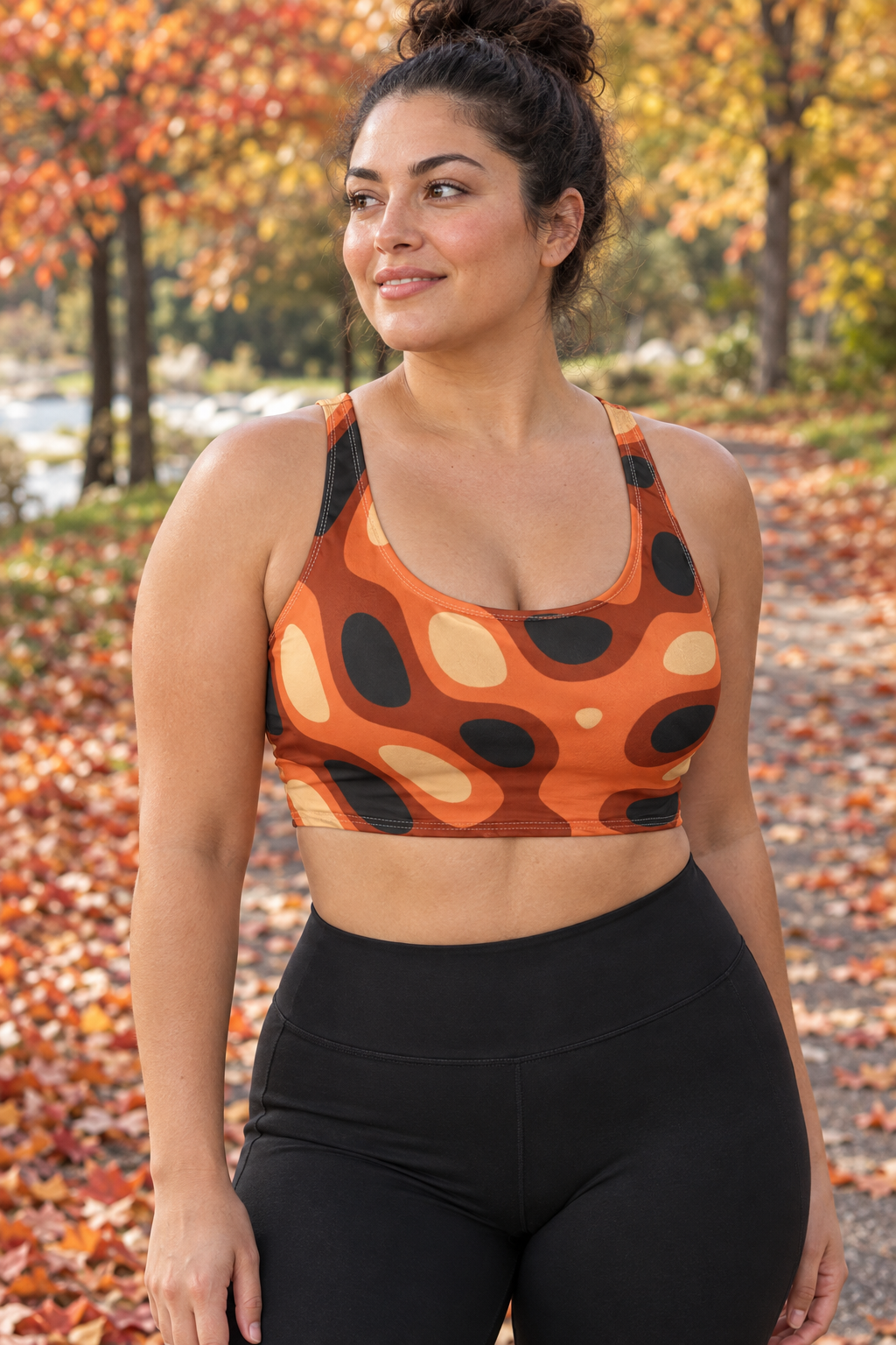 Pumpkin Ripple women's scoop-neck sports bra worn on a model