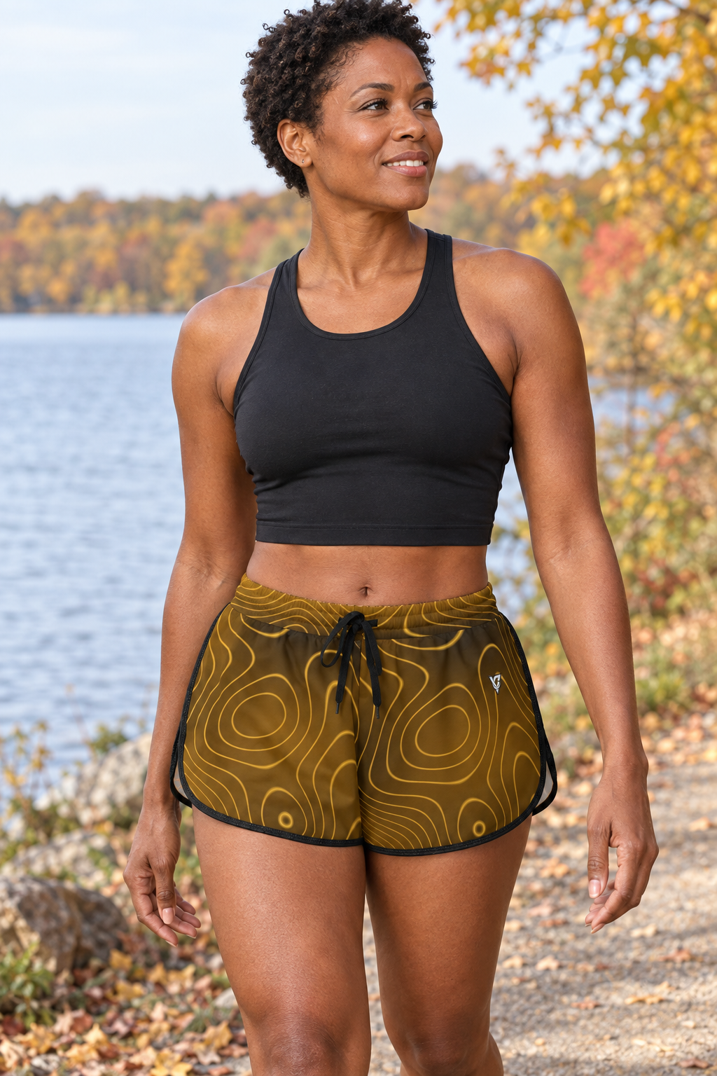 Harvest Gold Topo women's relaxed running shorts worn on a model