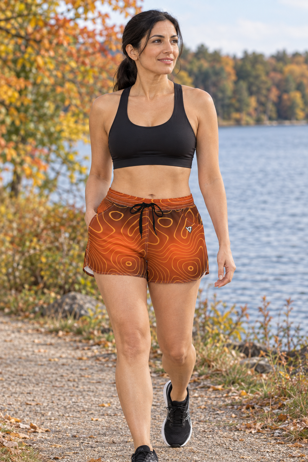 Golden Hour Topo women's lightweight athletic shorts worn on a model