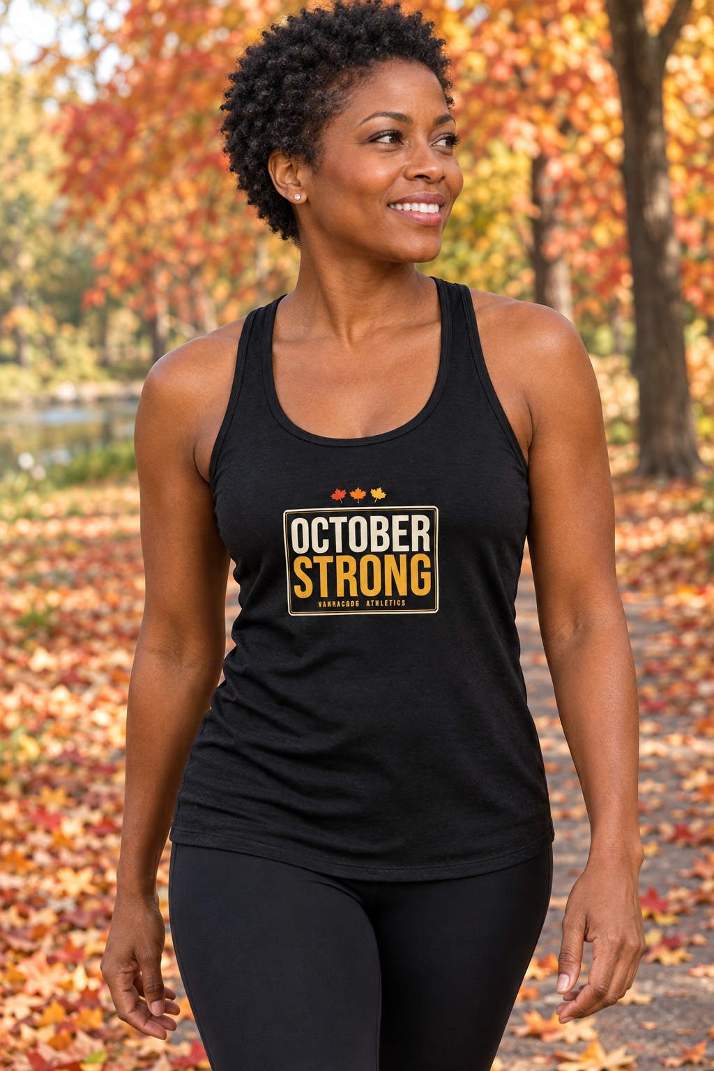 October Strong women's racerback performance tank top worn on a model