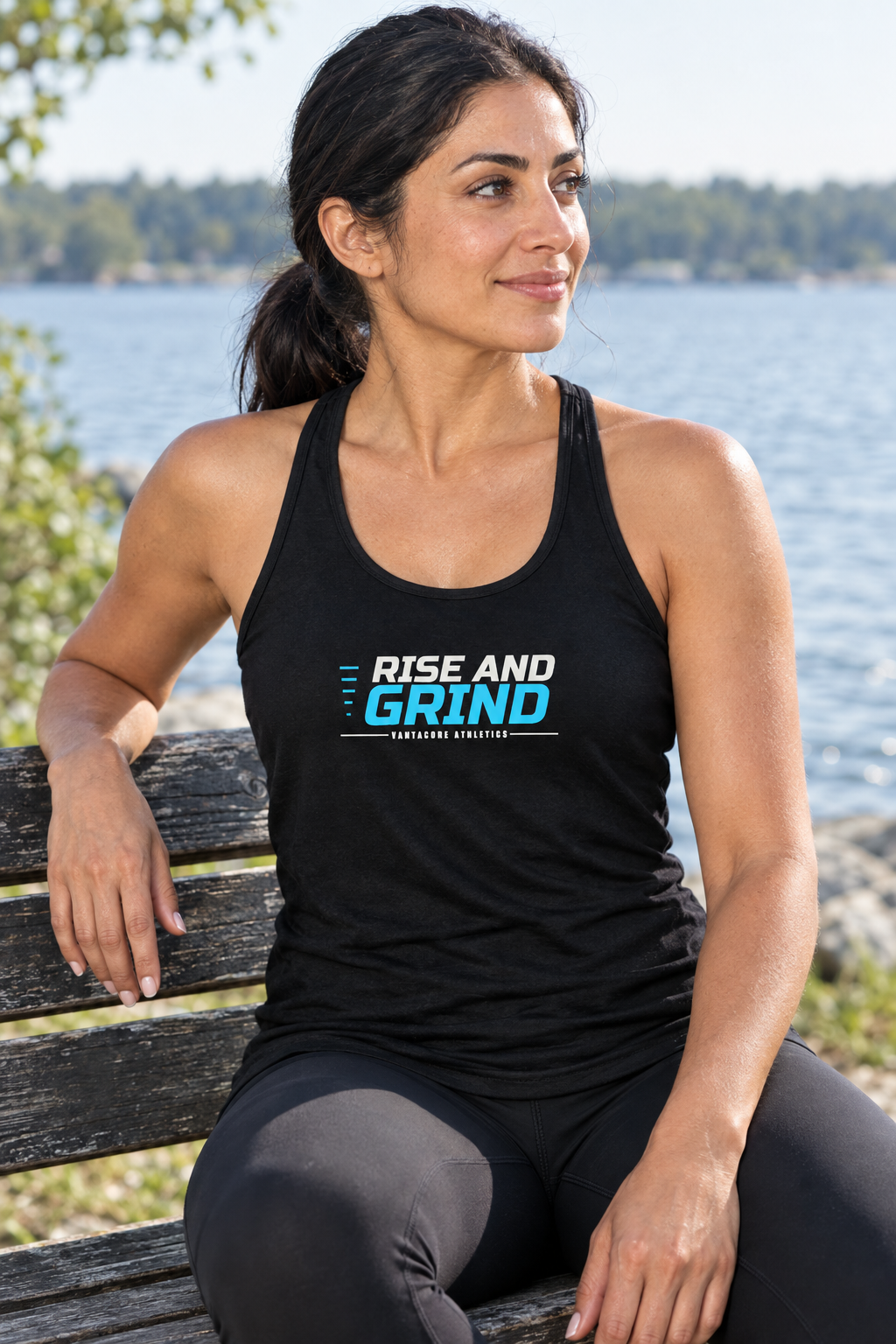 Rise And Grind women's racerback performance tank top worn on a model