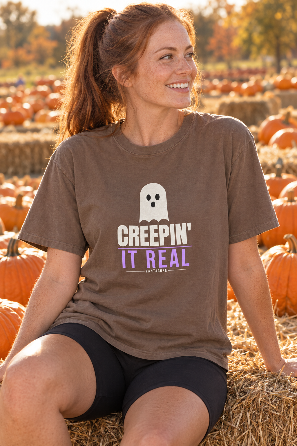 Creepin' It Real Halloween women's relaxed garment-dyed crew-neck t-shirt worn on a model