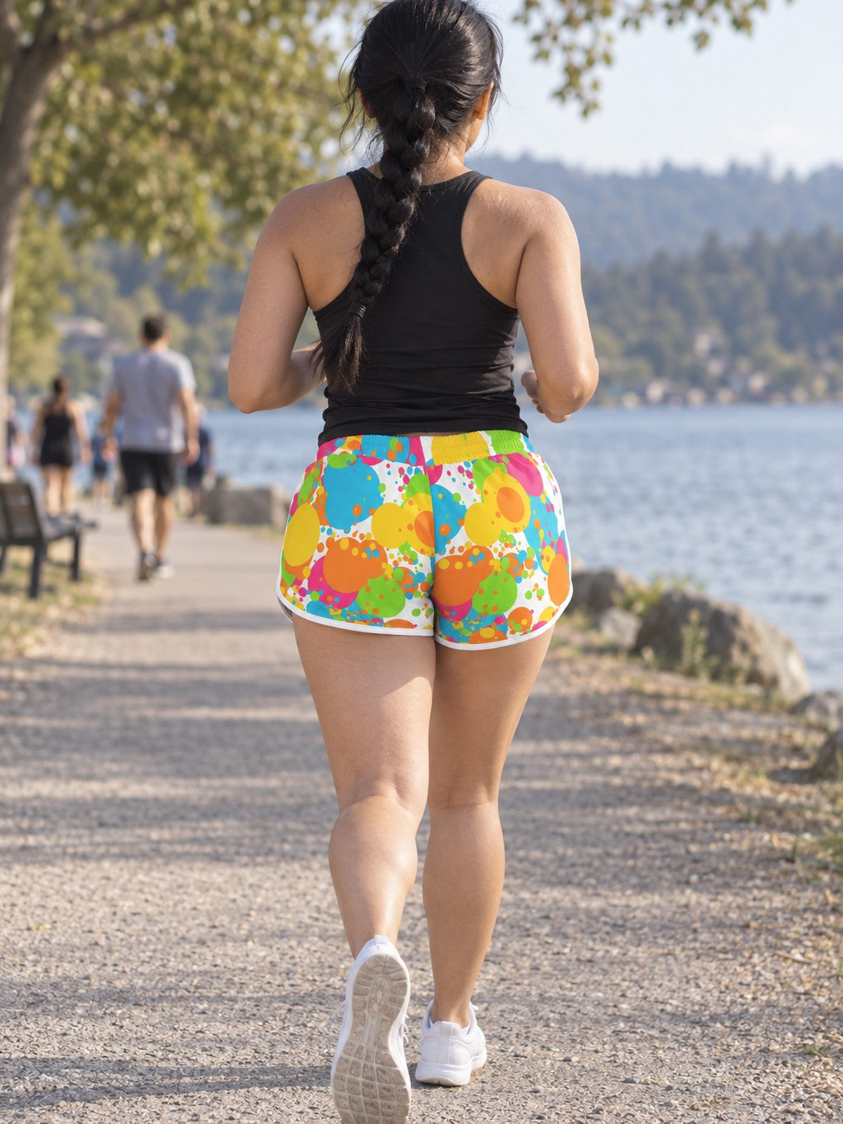 Woman wearing the Citrus Splash relaxed all-over print shorts – back view