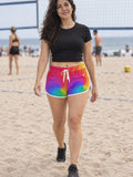 Woman wearing the Rainbow Tie-Dye relaxed all-over print shorts – front view