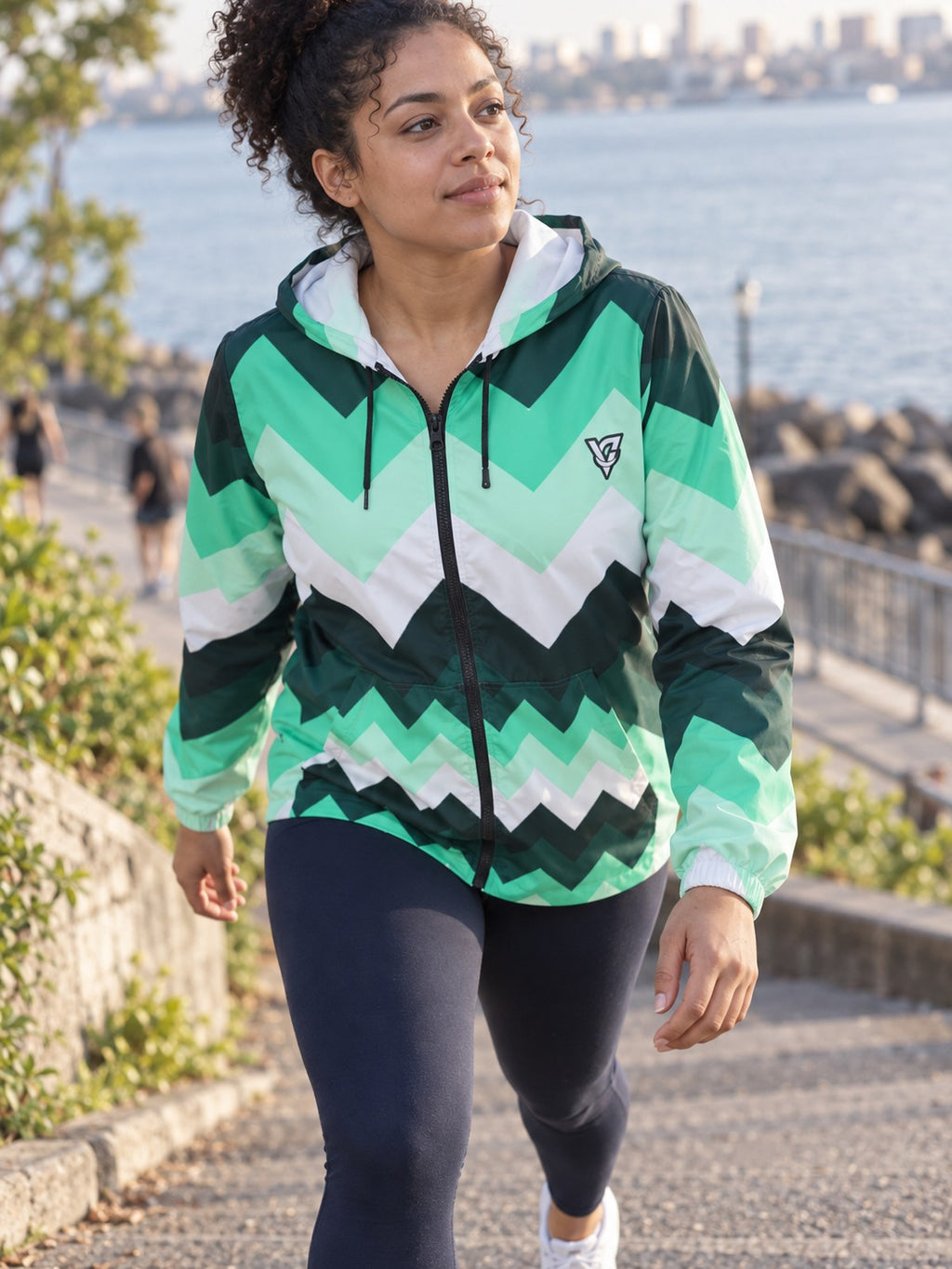 Woman wearing the Mint Chevron Women's Windbreaker Jacket