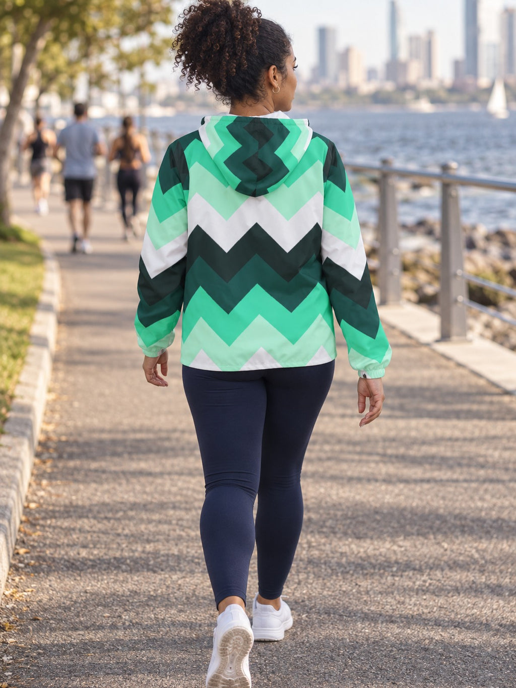 Woman wearing the Mint Chevron Women's Windbreaker Jacket